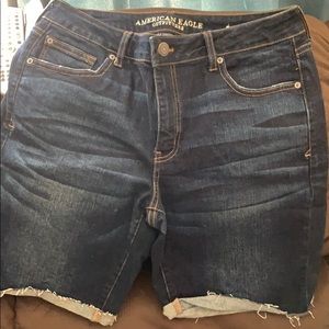 Jean Bermuda shorts with rolled torn cuff